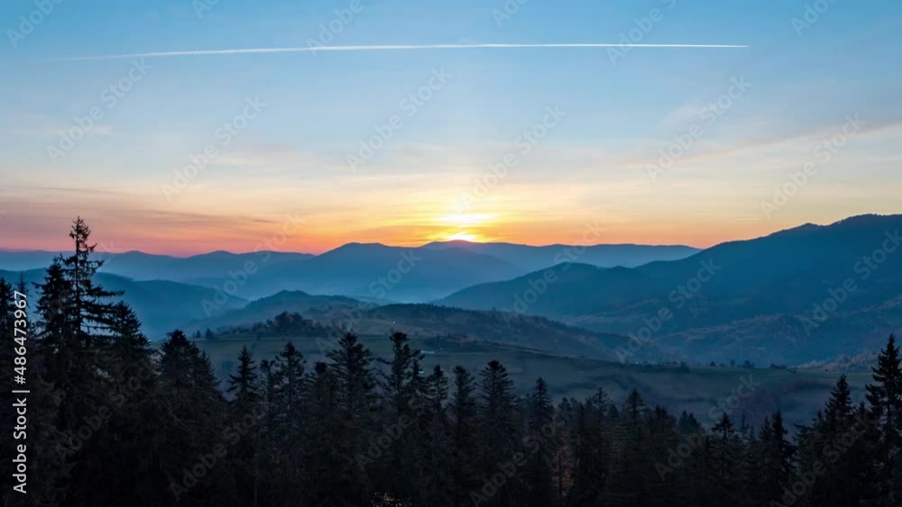 Coniferous forest in highland by hills from day till dusk Coniferous forest in highland by hills from day till dusk