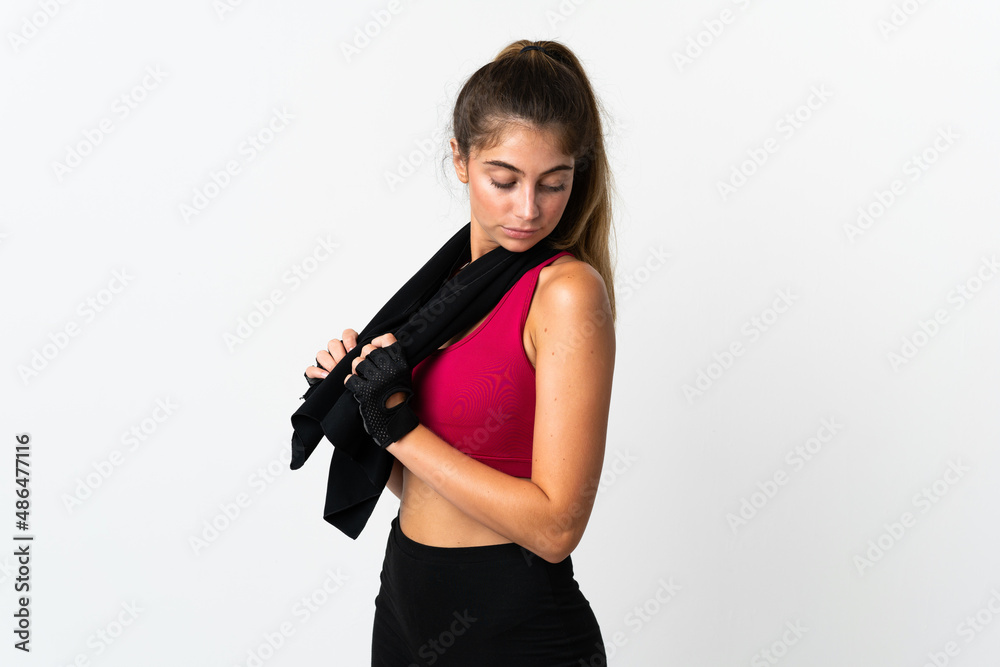 Young caucasian woman isolated on white background with sport towel Young caucasian woman isolated on white background with sport towel