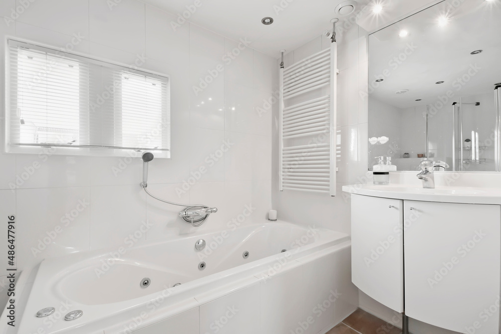 Bathroom in white style with all amenities and white tiles - obrazy, fototapety, plakaty 