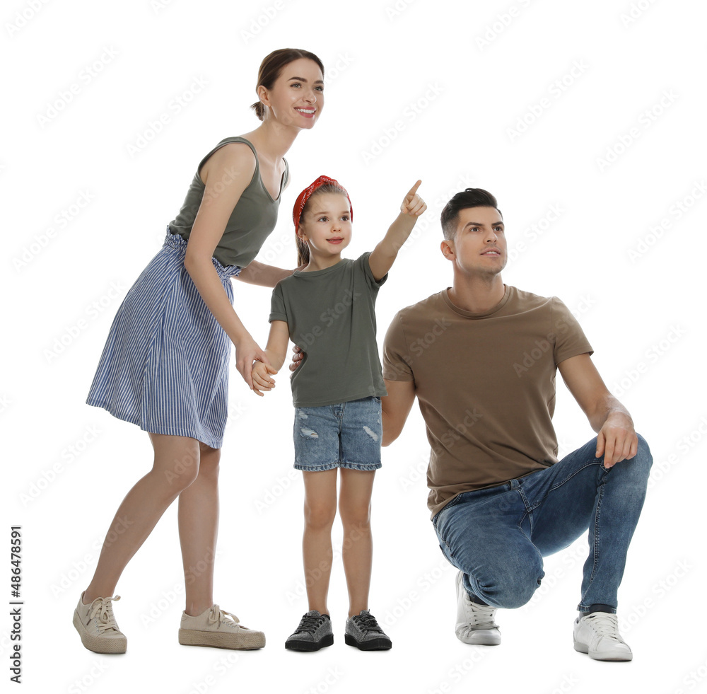 Fototapeta premium Little girl with her parents on white background
