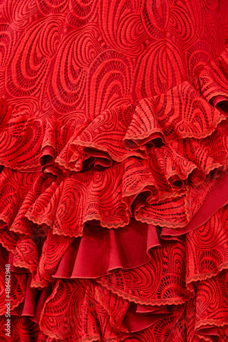 Obraz na płótnie Flamenco dress outfit detail, red color. Elegant spanish woman clothing w salonie