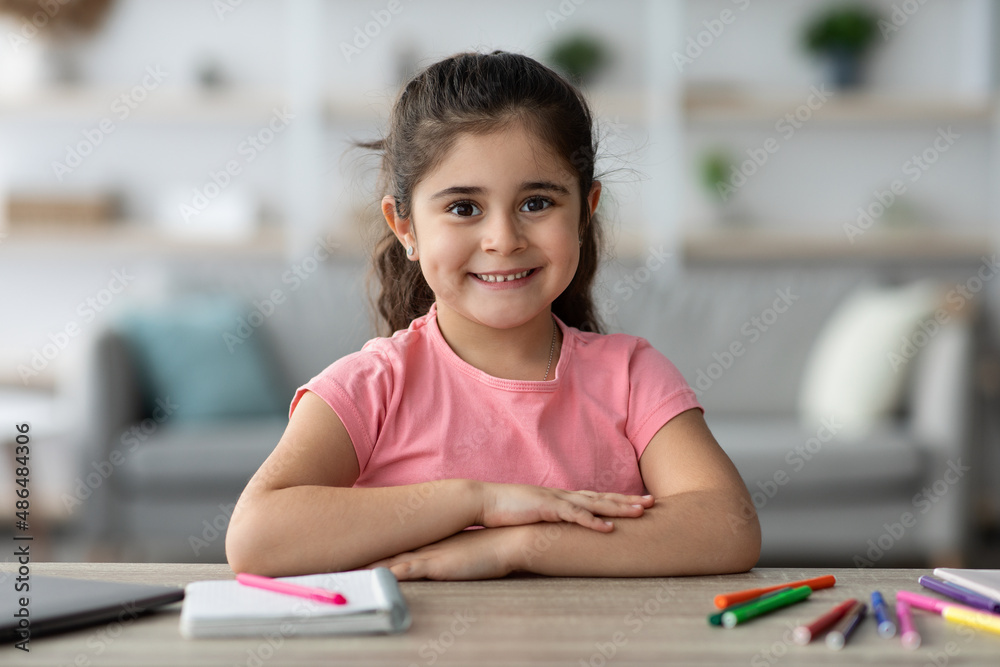 Beautiful Child Portrait. Cute Preteen Arab Girl Posing At Home Interior Beautiful Child Portrait. Cute Preteen Arab Girl Posing At Home Interior