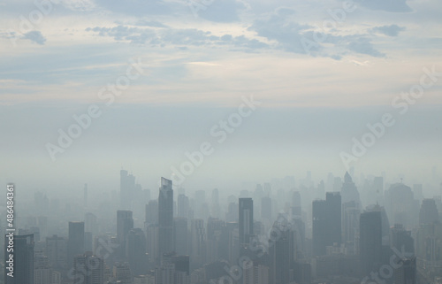 PM 2.5 fog and dust in a city crowded with buildings. © smilekorn