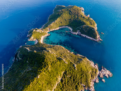 Aerial drone view of famous porto timoni beach in afionas village corfu , greece photo