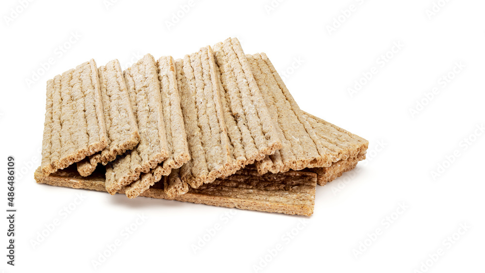 Fitness crispbreads isolated on white background. Healthy diet food. Whole grain crispy bread. Diet bread. Fitness crispbreads isolated on white background. Healthy diet food. Whole grain crispy bread. Diet bread.