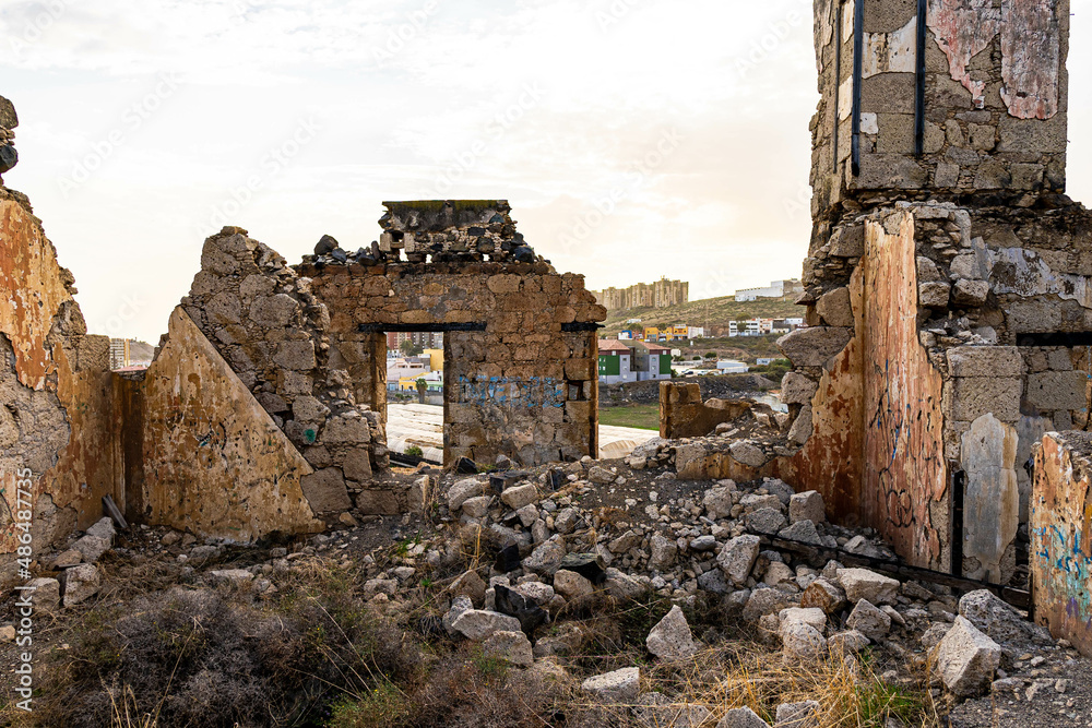 ruined castle in the canary islands in ruins with beautiful colors ruins of a bygone era of the canary islands with red colors known as the tojo de jinamar castle with ancient architecture