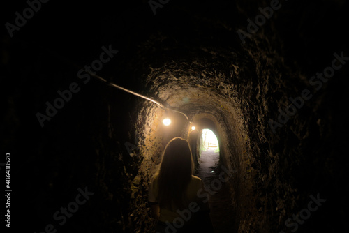 Girl venturing into gold mines in Ouro Preto - MG photo