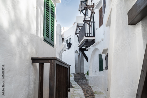 Views of the picturesque white village of Binibeca Vell in Menorca, Balearic Islands photo