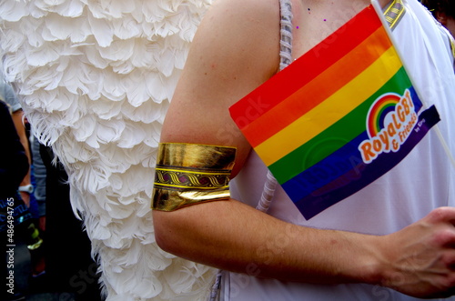 person with rainbow flag