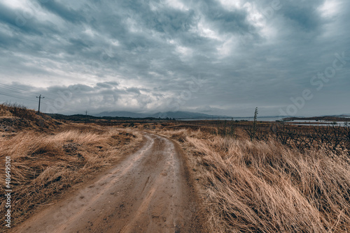 Photo of picturesque mountain area  road  blue cloudy sky