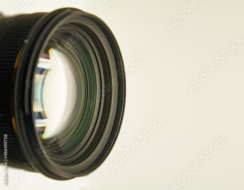 Photographer's lens in a photo studio.Studio photography.