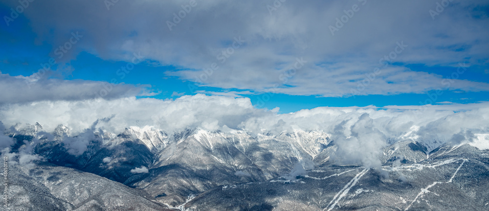 mountains with white snow and blue sky
