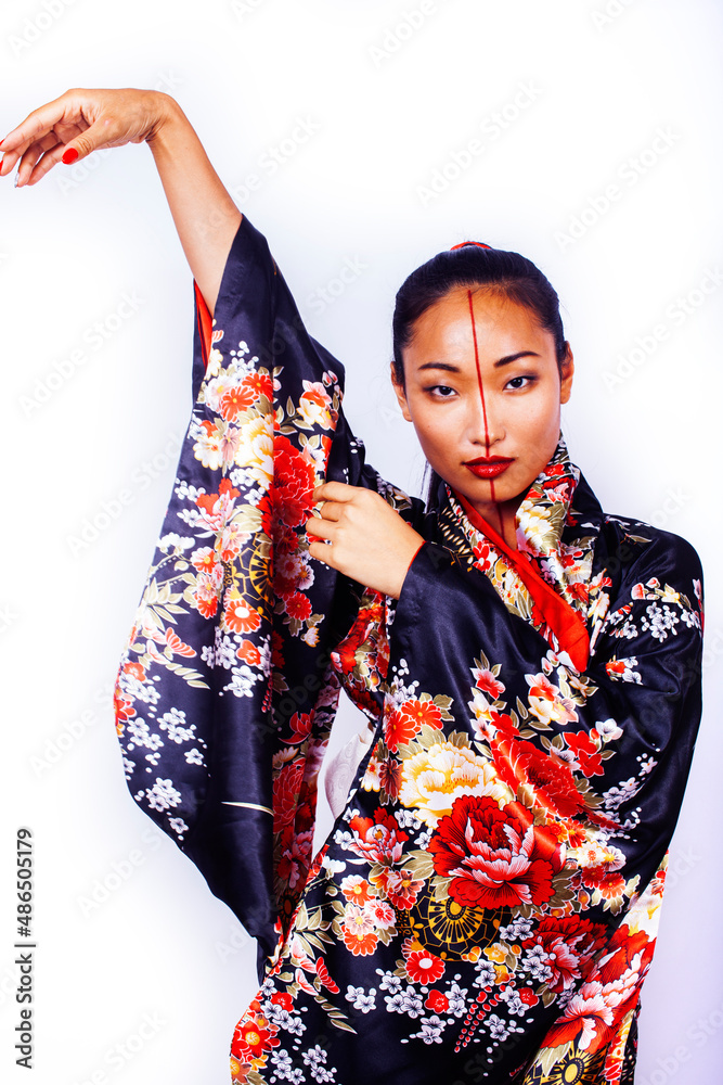 young pretty geisha in black kimono posing isolated on white background, asian ethno young pretty geisha in black kimono posing isolated on white background, asian ethno