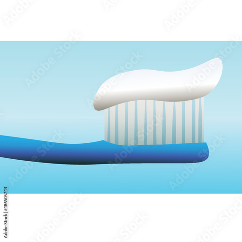 Blue toothbrush with toothpaste. Oral hygiene.