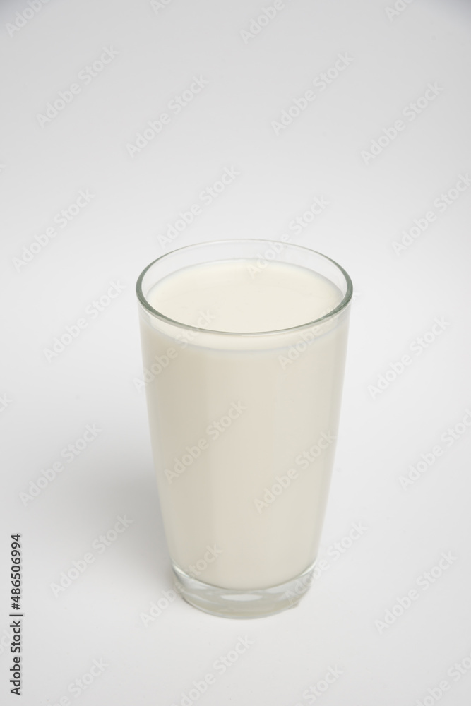 Milk glass closeup on white background Milk glass closeup on white background