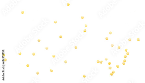 Millet groats isolated on a white background.