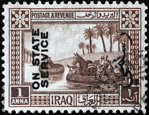 Traditional iraqi rafts on vintage postage stamp