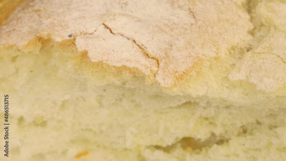 Wheat bread expanding, macro shot. Crust and breadcrums detail close up. Wheat bread expanding, macro shot. Crust and breadcrums detail close up.