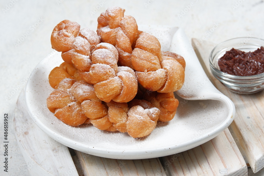 Korean Twisted doughnuts (donut) or Bread Stick, Wang kkwabaegi (kkwabaegi ) also known in the philippines as a Shakoy or pilipit Korean Twisted doughnuts (donut) or Bread Stick, Wang kkwabaegi (kkwabaegi ) also known in the philippines as a Shakoy or pilipit