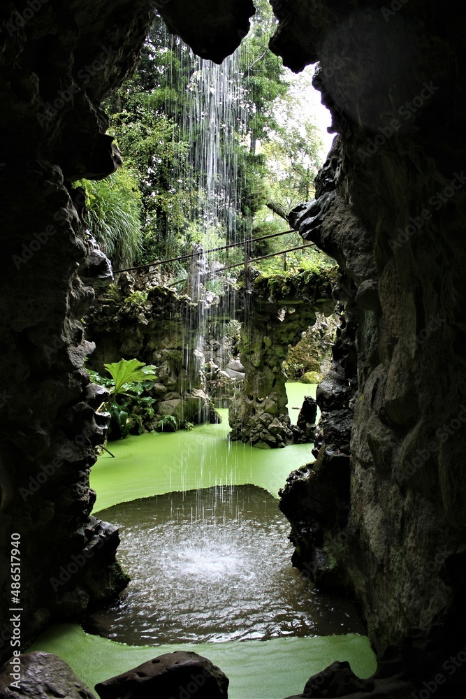 Grotto and waterfall - obrazy, fototapety, plakaty 