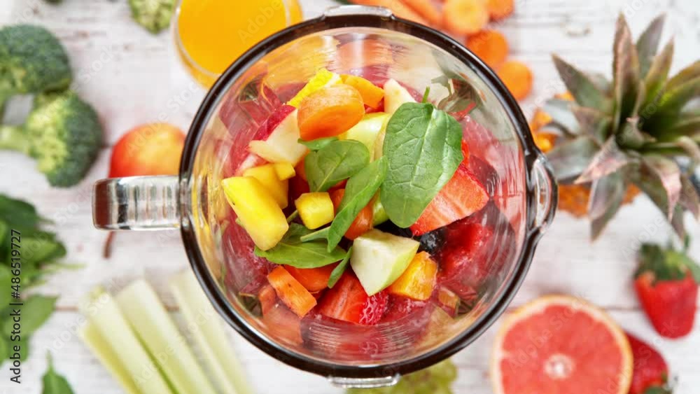 Super slow motion of mixing pieces of fruits in blender. Filmed on high speed cinema camera, 1000 fps.