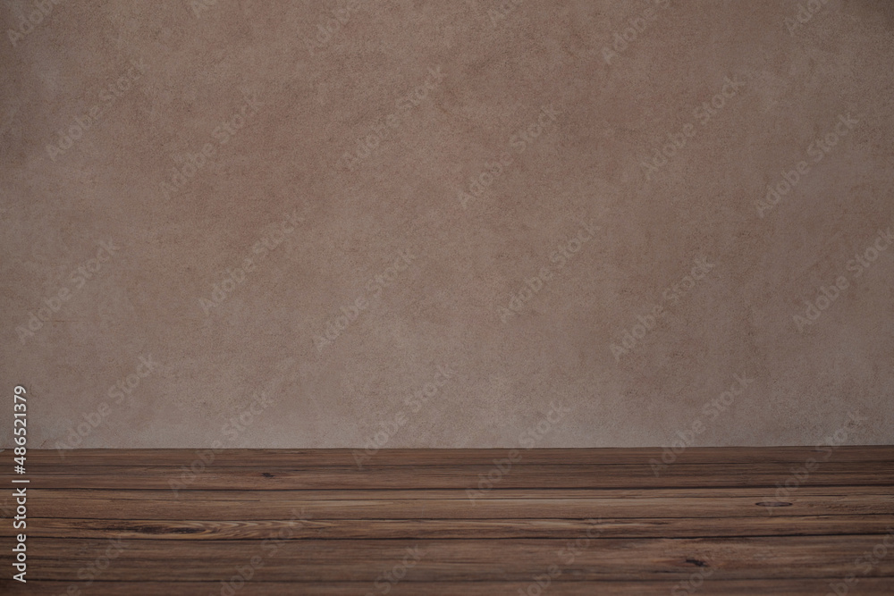 Background for photo sessions consisting of brown wall and wooden floor Background for photo sessions consisting of brown wall and wooden floor