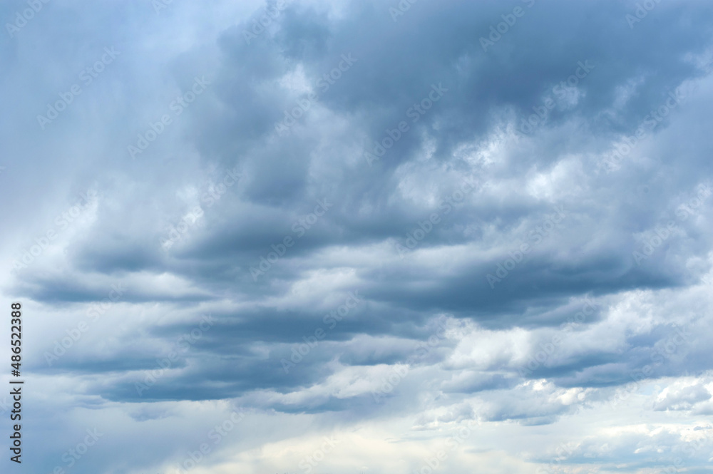 clouds of spring storm sky. Dark sky, danger. Weather forecast screensaver, website, banner.