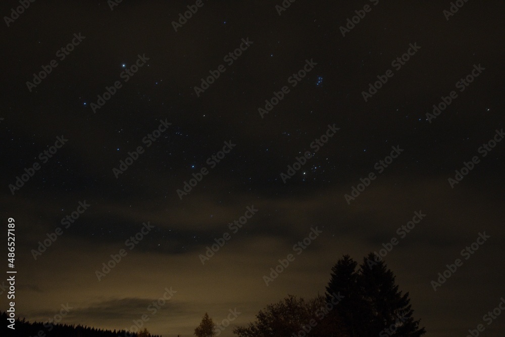 time lapse of clouds and stars