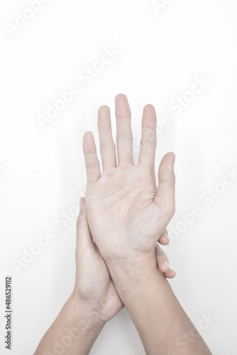 Pale palmar surface of both hands. Anaemic hands of Asian, Chinese man.