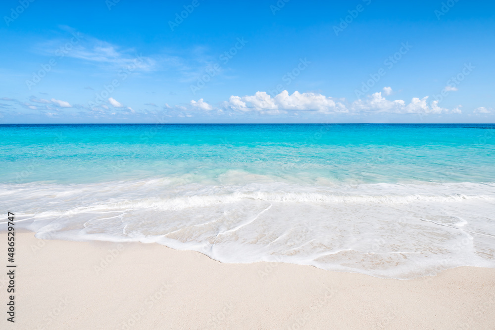 Summer vacation at a beautiful beach with white sand and turquoise sea