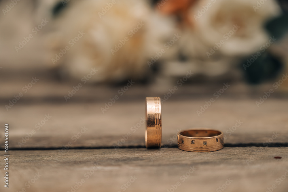 Wedding rings and roses bouquet Wedding rings and roses bouquet
