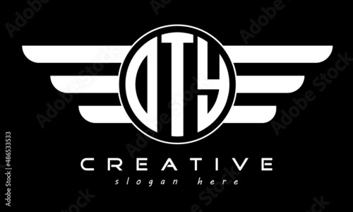 OTY three letter monogram type circle letter logo with wings vector template. photo