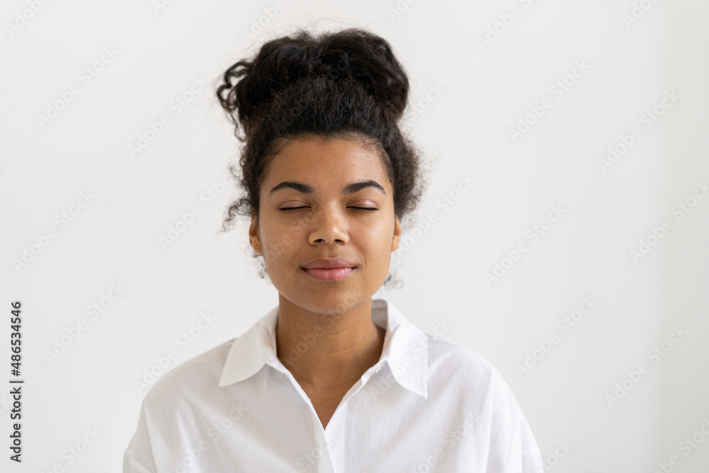 Peaceful Afro American girl with closed eyes Peaceful Afro American girl with closed eyes