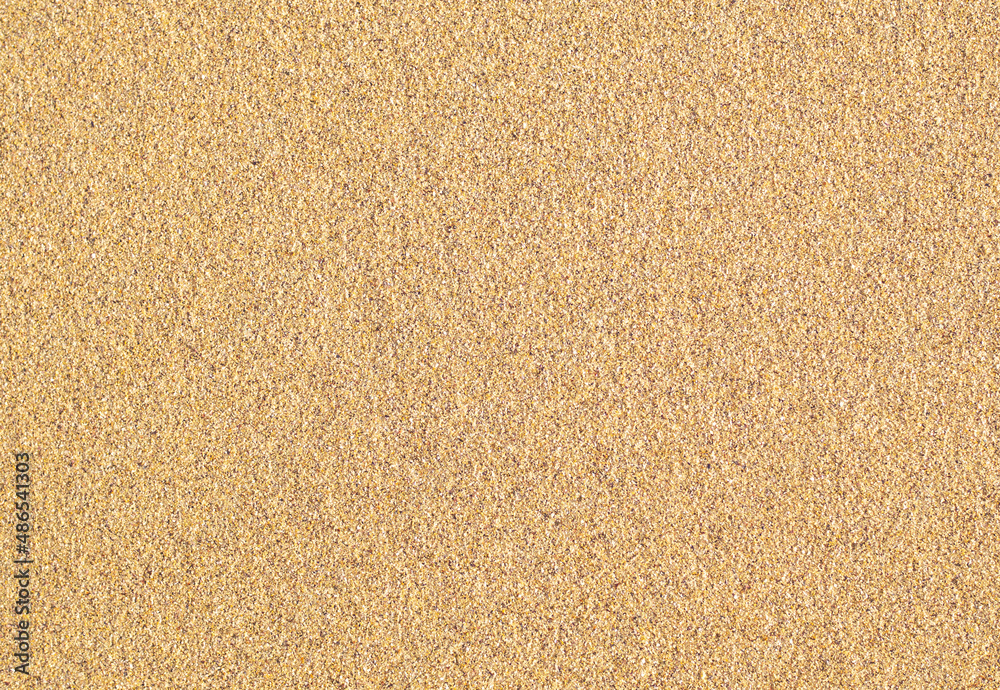 Sand texture. Top view summer coarse sea sand background Sand texture. Top view summer coarse sea sand background