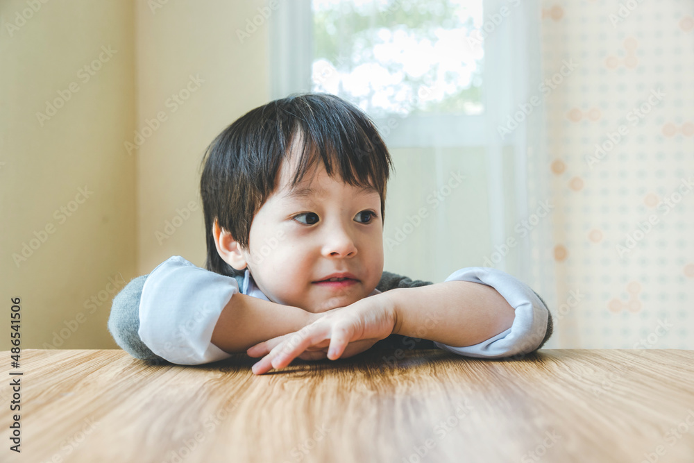 Happy asian little boy on bed. Happy asian little boy on bed.