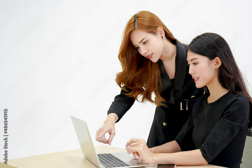 Business women talking together teaching to trade Business women talking together teaching to trade