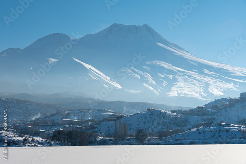 Hasan Mountain and frozen Helvadere Lake view in Aksaray Province of Turkey photo