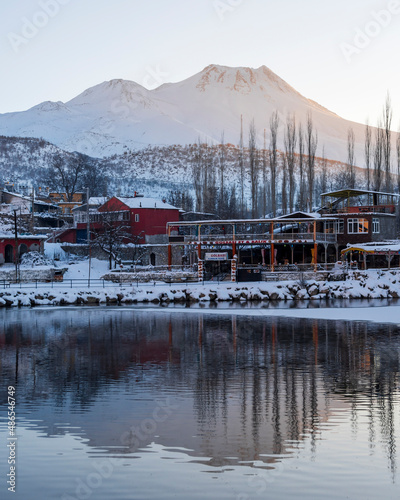 Hasan Mountain and frozen Helvadere Lake view in Aksaray Province of Turkey photo