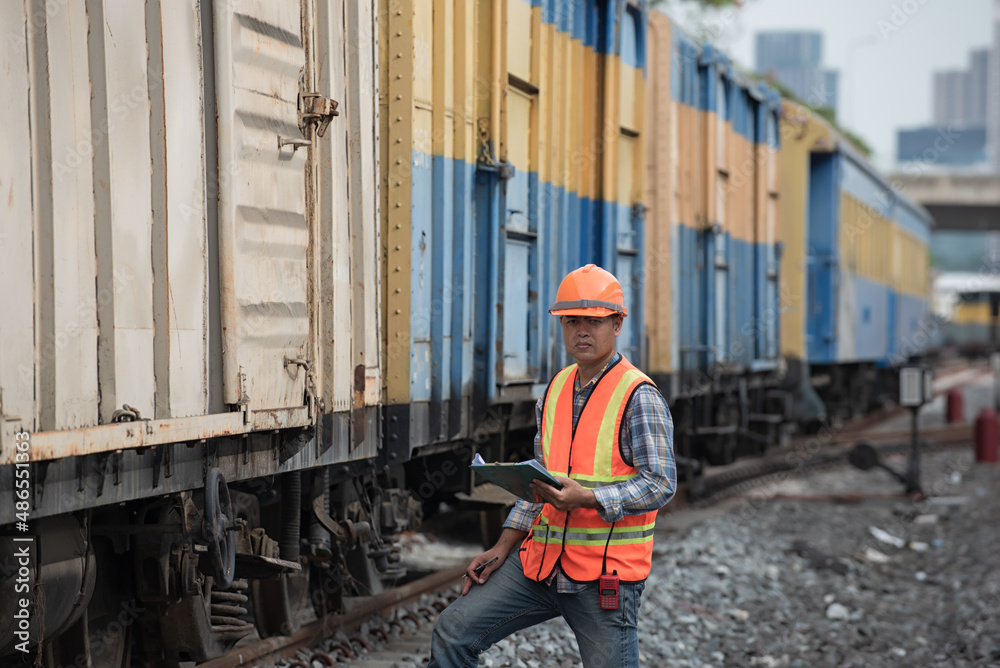 train on railway station. engineer walking on railway inspection. construction worker on railways. Engineer work on railway. rail, engineer, Infrastructure