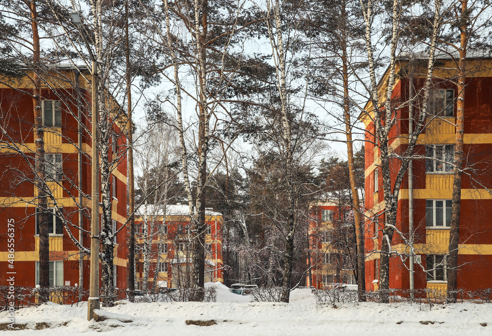 Old small residential area in the middle of the forest in winter. Outdoors Old small residential area in the middle of the forest in winter. Outdoors