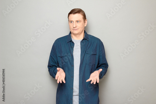 Portrait of confused mature man not understanding what happened