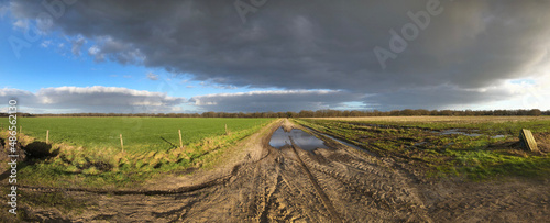 Dark clouds above the Uffelter Es Drente Netherlands. Winter. Uffelte. Panorama. Fields.