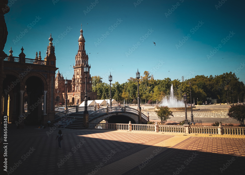 Naklejka premium Seville, Spain: 03-07-2021: Seville Sevilla Plaza de Espana in Andalusia Spain square. is a square in the Parque de Maria Luisa, Historical landmark. Arabic ceramic style.