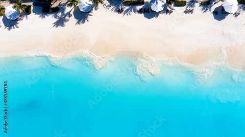 Aerial top down view of the turquoise sea of Cape Santa Maria beach on Long Island, The Bahamas