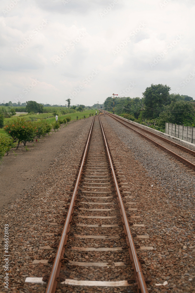 railroad tracks in the countryside in java Indonesia