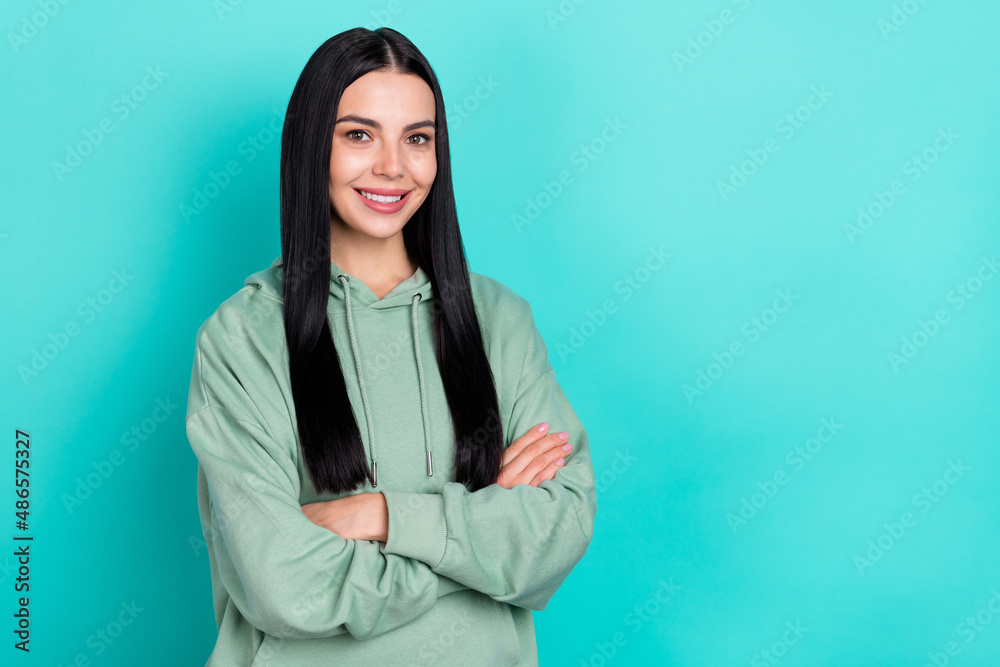 Photo of optimisitc millennial black hairstyle lady crossed palms wear green sportscloth isolated on turquoise color background Photo of optimisitc millennial black hairstyle lady crossed palms wear green sportscloth isolated on turquoise color background