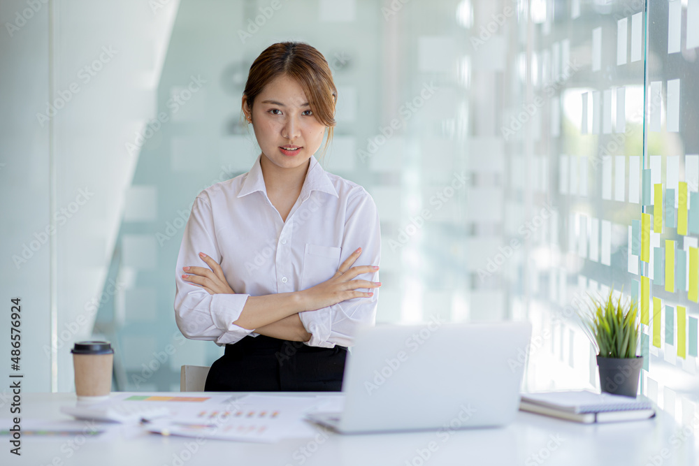 Beautiful Asian woman is a businesswoman who leads a new generation of startups, a woman who runs and manages a business plan to build confidence and stability in business, woman-led business concept. Beautiful Asian woman is a businesswoman who leads a new generation of startups, a woman who runs and manages a business plan to build confidence and stability in business, woman-led business concept.