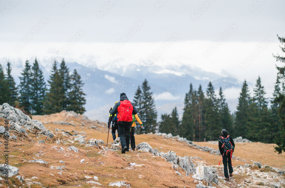 hiking in mountains travel adventure vacations group hikers reaches the snowy mountain peak trekking outdoor healthy lifestyle eco tourism