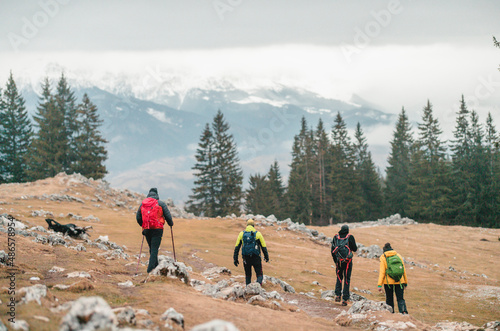 Fotografie People hiking in beautiful winter mountains for winter sport activity snow mountain hills