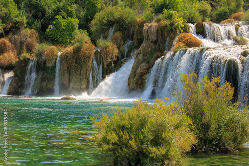 View of waterfall cascade on a sunny day in Krka National Park  Croatia